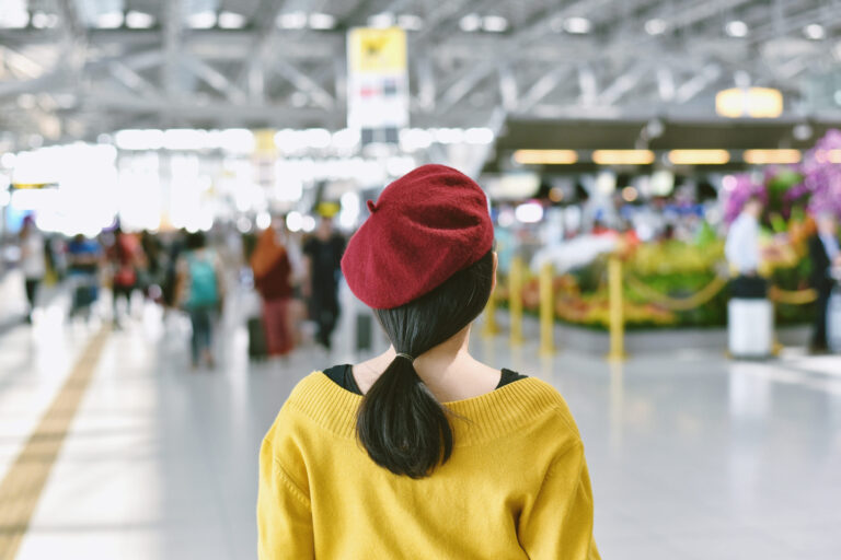 woman looking at trade show displays