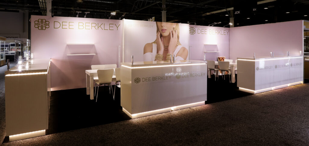 Dee Berkley trade show booth with jewellery display cases