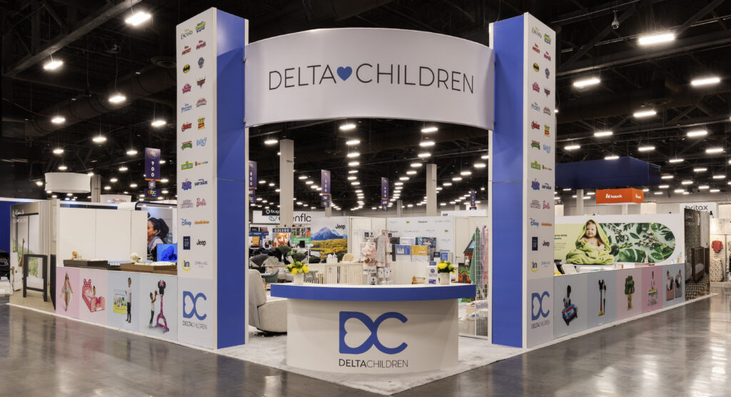 Delta trade show exhibit with wide branded header