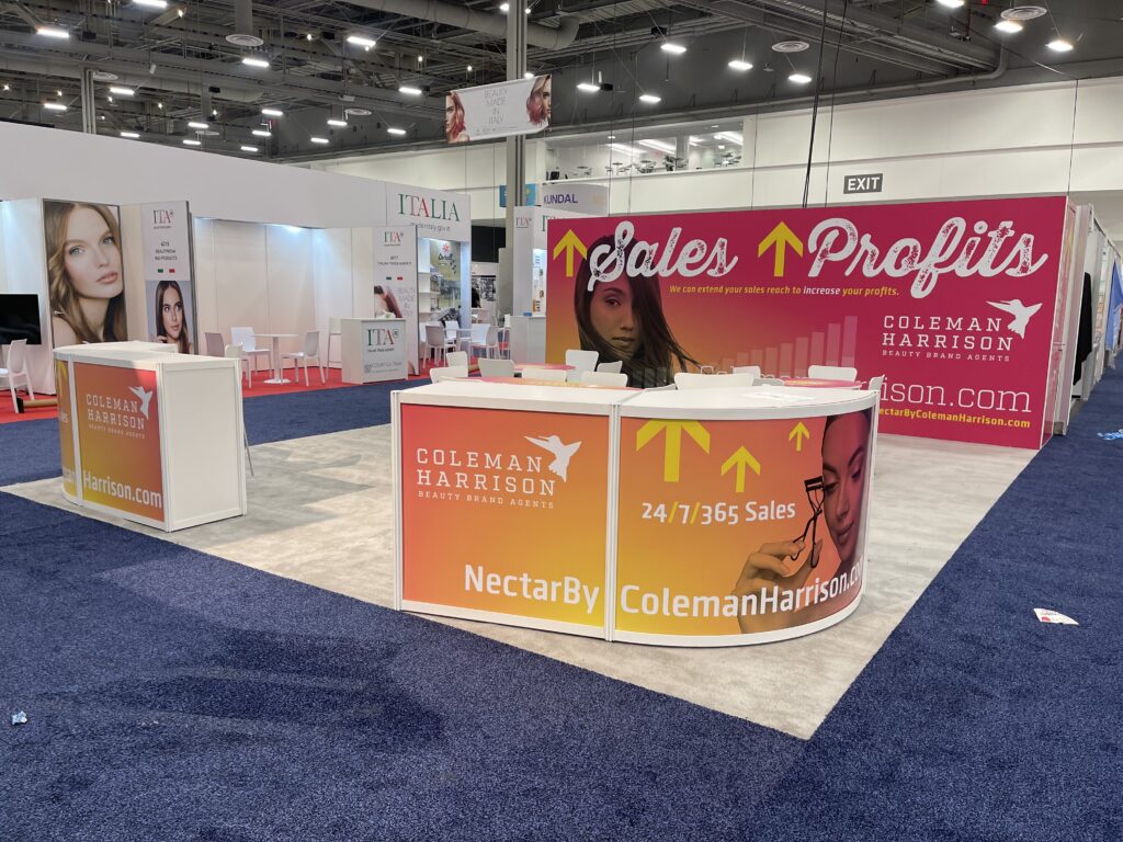 Custom trade show exhibit with curved display walls