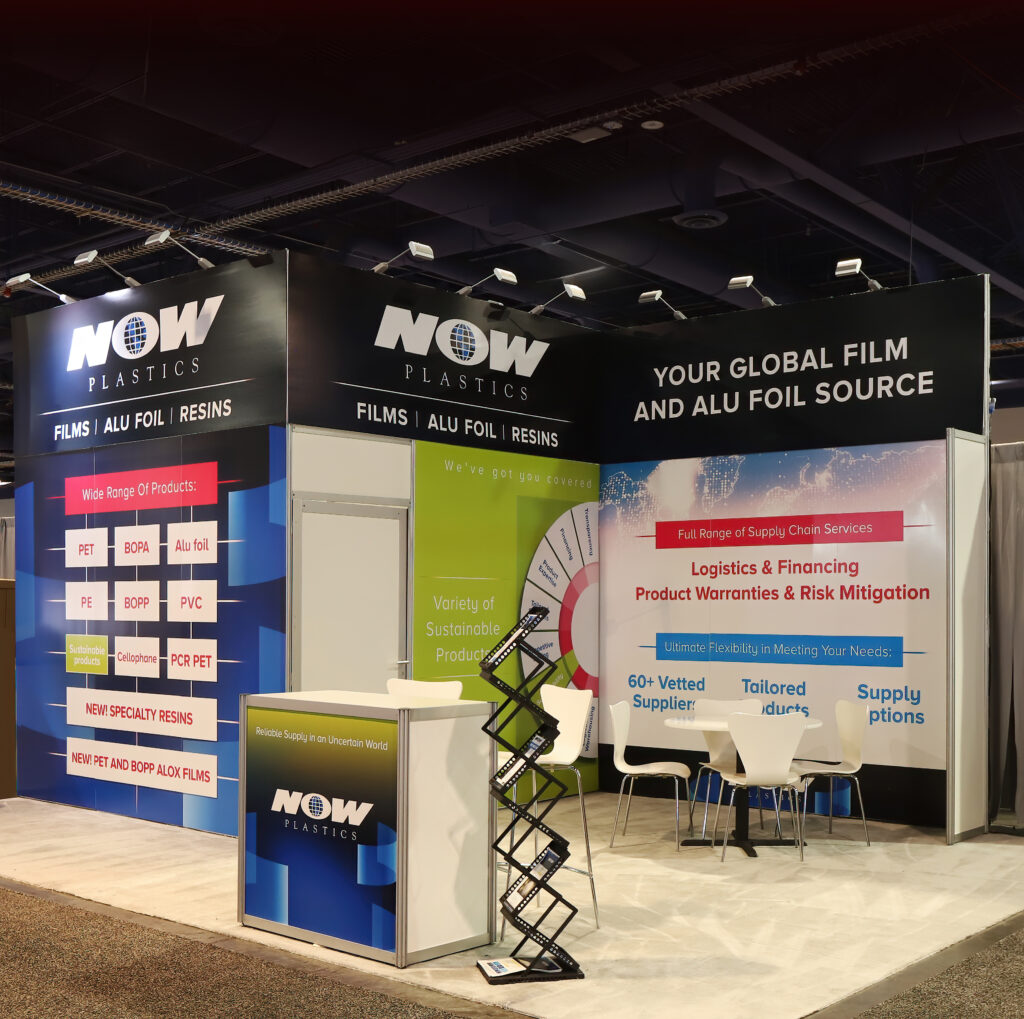 Now Plastics trade show booth with product display wall