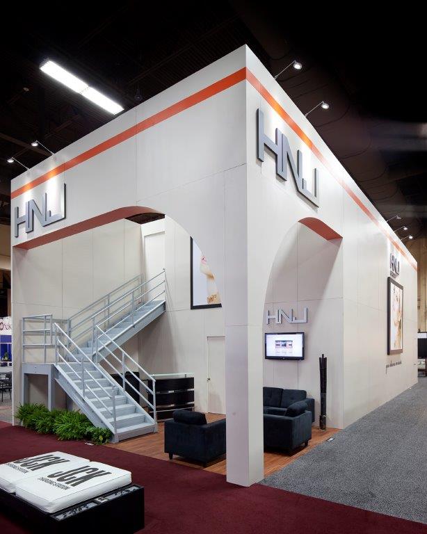 Multi-level trade show booth with upstairs hospitality deck