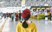 woman looking at trade show displays