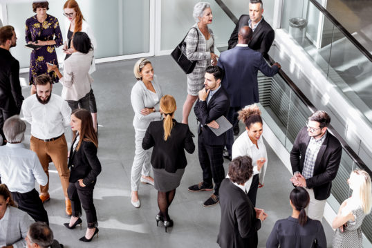 people standing around at a convention